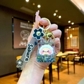 Cartoon character liquid oil keychain with blue glitter sand and silicone wristband - Black Cloud Rope