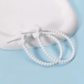 Detailed view of white floral silicone cable ties for wire management and home organizing - Plum Blossom / 2 Pcs/Set / White