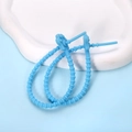 Gros plan sur des attache-câbles en silicone bleu ciel avec design patte de chat mignon - Patte de chat / 2 Pièces/Ensemble / Bleu