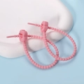 Close-up of pink flower silicone cable ties on a white tray with blue background - Plum Blossom / 2 Pcs/Set / Pink