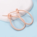 Detail view of pink silicone cable ties with star-shaped buckles for wire management - Pentagram / 2 Pcs/Set / Nude Pink