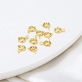 Macro shot of 18K gold-plated spring ring clasps for handmade jewelry necklaces - 5mm/Aperture 1.1mm / 18K Color-Preserving Real Gold (2 Pieces)