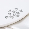 Assorted silver spring ring clasps for jewelry making displayed on a white tray - 5mm/Aperture 1.1mm / Platinum Color-Preserving Real Gold (2 Pieces)
