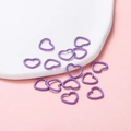 Macro detail of heart-shaped jump rings with grainy purple texture for DIY jewelry making - 12x14mm/Thickness 1.5mm (50 Pieces/Pack) / Purple