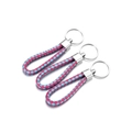 Detail of three woven PU leather keychains in rose pink and light blue with silver rings - 5 Pieces / Rose Red Sky Blue