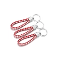Close-up of red and white braided leather keychain with metallic ring and silver hardware - 5 Pieces / Red & White