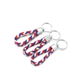Detailed view of three braided leather keychains in red, white and blue colors - 5 Pieces / Red Blue White