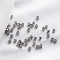 Silver crimp beads for DIY jewelry making on white fabric background, macro view - 1.2*2.0mm (100 Pieces) / White Gold