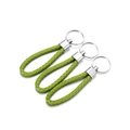 Detailed view of three grass green braided PU leather keychains with silver metal rings - 5 Pieces / Grass Green