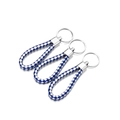 Detailed view of three blue and white braided PU leather keychains with silver metal rings - 5 Pieces / Dark Blue and White