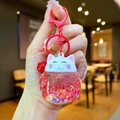 Cute Lucky Cat keychain with red liquid quicksand and floral sequins in white variant - Colored Hardware Luminous Style / Red