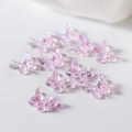 Macro shot of iridescent pink mini resin butterflies for DIY crafts and nail art - Small Pack / Purple
