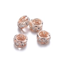 Détail de perles d'espacement en or rose serties de cristaux blancs pour bijoux DIY - Or rose