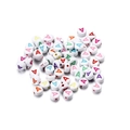 Macro shot of white acrylic round beads with colorful printed letter A for DIY jewelry - Style A / 7mm (100 Pieces/Pack)