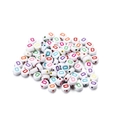 Detailed macro view of white acrylic beads featuring colorful letter D for jewelry making - Style D / 7mm (100 Pieces/Pack)