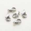 Detailed view of five silver-plated lobster clasps for DIY jewelry making sets - White Gold