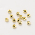 Gros plan de perles de roue plates plaquées or 18 carats pour bijoux DIY - 3mm/Trou 1,2mm (30 pcs/3g) / Or 14K