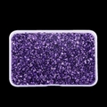 Detail view of irregular purple glass stones in a transparent box for DIY crafts - Bright Purple