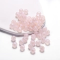 Macro shot of faceted pink acrylic beads with iridescent finish for DIY jewelry crafting - Pearlescent Polyhedron / 8mm (50pcs/Pack) / Pink