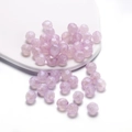 Close-up of faceted lavender acrylic mermaid beads with pearlescent glitter for DIY crafts - Pearlescent Polyhedron / 10mm (30 Pieces/Pack) / Purple