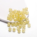 Macro shot of faceted yellow acrylic mermaid beads with pearlescent finish for DIY jewelry - Pearlescent Polyhedron / 10mm (30 Pieces/Pack) / Yellow