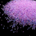 Macro shot of purple iridescent glass bubble beads for DIY resin and nail art deco - Light Purple