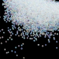Macro shot of 1mm aurora iridescent glass micro beads for nail art and DIY resin crafts - 1-1.5mm Iridescent Transparent