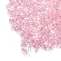 Macro shot of iridescent pink bubble beads for DIY jewelry and nail art decoration - Pink