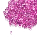 Macro shot of assorted size pink and purple iridescent bubble glass beads for DIY nails - Rose Red