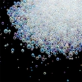 Macro detail of iridescent bubble glass beads with AB rainbow coating for DIY crafts - 20g/Pack / No.1 Mixed Clear Color