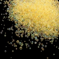 Macro shot of mixed size yellow iridescent glass bubble beads for DIY resin craft - 20g/Pack / Yellow