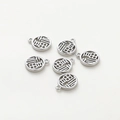 Macro shot of 6 silver Fu pendants with hollow character design for DIY jewelry - Platinum Color Hollow Lucky Fu