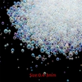 Macro shot of 0.4-3mm iridescent glass bubble beads for DIY resin art and nail decoration - 20g/Pack / No.1 Mixed Clear Color