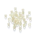 Macro-opname van heldere iriserende acryl kralen met pailletten voor DIY sieraden - Geel