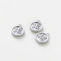 Detailed macro view of three silver Fu character charms with relief engraving for DIY jewelry - 8mm (Pack of 5) / Platinum Color Lucky Fu Tag