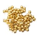 Macro shot of gold star-shaped CCB beads with central holes for DIY jewelry making - Star / 100pcs Pack / Gold