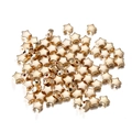 Macro shot of gold star-shaped CCB spacer beads with center holes for DIY jewelry - Star / 100pcs Pack / KC Gold