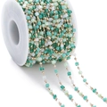 Close-up of DIY jewelry chain with green and white square beads on a spool - Green Colored (KC Gold Chain)