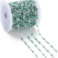 Detail of crystal stone colorful bead chain with green tassels on white plastic spool - Green Colored (Rhodium Chain)