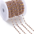 Macro detail of handmade beaded chain with gold round beads and purple square resin beads - Purple (Imitation Gold Chain)