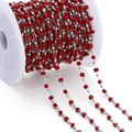 Detail of DIY chain with red cube beads and silver round beads on a white plastic spool - Red (Rhodium Chain)