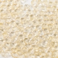 Macro view of light champagne heart-shaped glass beads with subtle glitter for DIY jewelry - 20 Pieces/Pack (Approx 4g) / Light Yellow