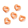 Close-up of matte orange heart-shaped acrylic rings for DIY jewelry and accessory making - 5 Pieces/Pack (19x20.5mm) / Orange