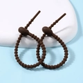 Brown star-shaped silicone cable ties for wire management with adjustable bead design - Ellipse / 2 Pcs/Set / Brown