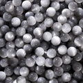 Macro detail of silver gray resin cat eye beads for jewelry making and DIY beadwork - Gray