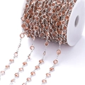 Detailopname van 1 meter zilveren ketting met amberkleurige zirkoon op een witte spoel - Pakket van 1 Meter (6.8mm) / Wit K Ketting Champagne Zirconia