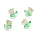 Macro shot of green glass trumpet flower beads and leaves with through-holes for DIY jewelry - 10 Flowers + 10 Leaves / Green Morning Glory