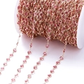 Detail van roségouden ketting met roze zirkoon op een witte spoel voor sieraden maken - Pakket van 1 Meter (6.8mm) / KC Goud Ketting Roze Zirconia