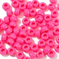 Macro detail of hot pink acrylic pony beads with smooth finish for DIY jewelry crafts - 100 Pieces/Pack (6x9mm) / Rose Red