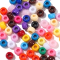 Macro shot of colorful acrylic barrel beads with large holes for DIY jewelry making - 100 Pieces/Pack (6x9mm) / Multicolor